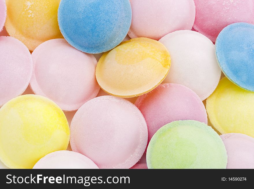 Background of flying saucer multi coloured candy sweets. Background of flying saucer multi coloured candy sweets
