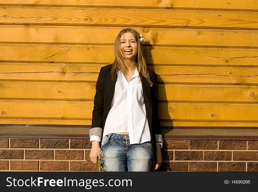 Girl Standing In Front Of A  House