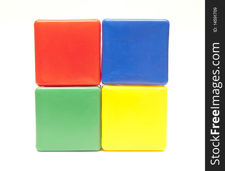 Colored childrens cubes on a white background. Colored childrens cubes on a white background