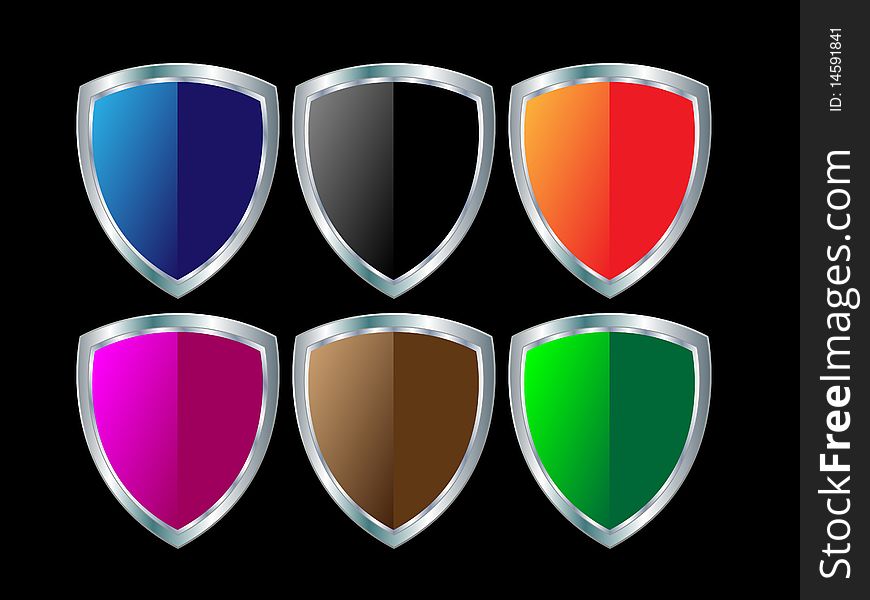 Steel shields in different colors on black background