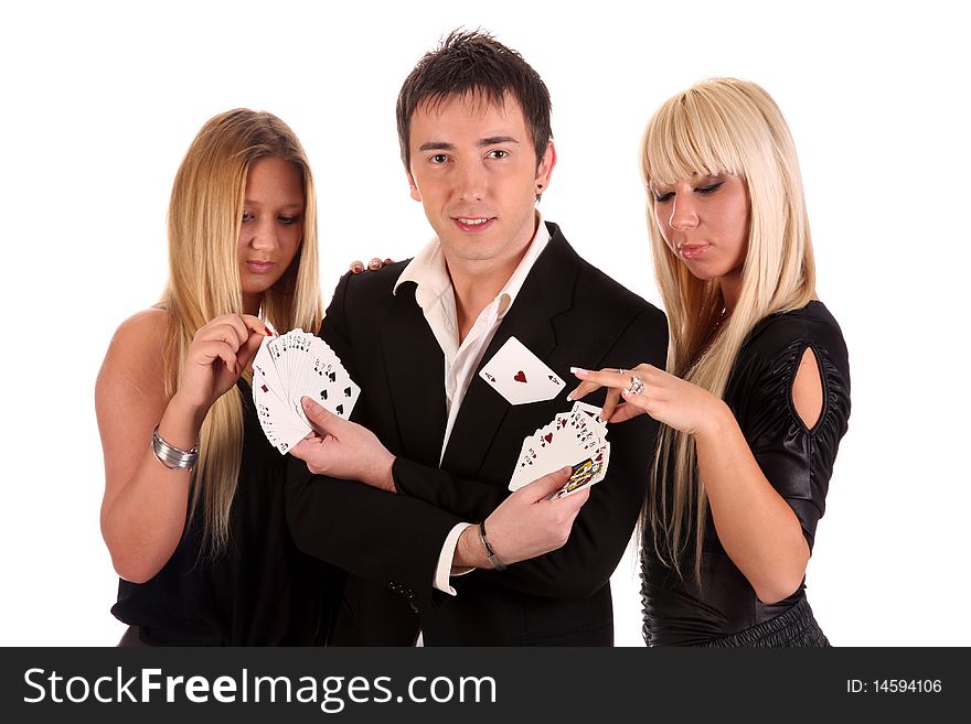 Magician make performance cards with two beauty girls