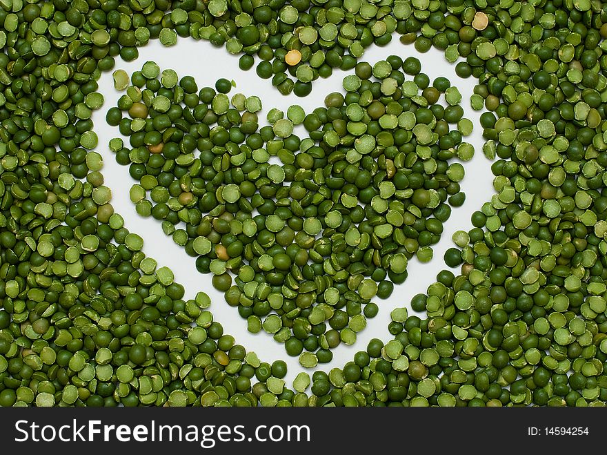 Love symbol on pea background. Love symbol on pea background