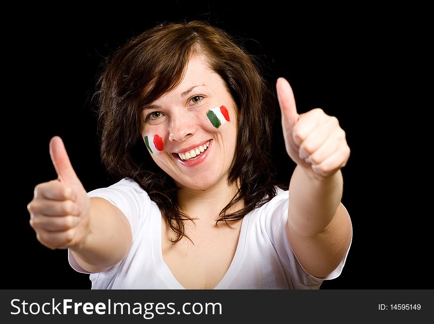 Young female show thumb up gesture, italian team fan with flags on her cheeks, studio shoot isolated on black background. Young female show thumb up gesture, italian team fan with flags on her cheeks, studio shoot isolated on black background