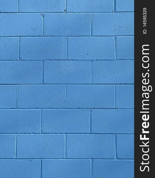 Blue wall made of cinder blocks