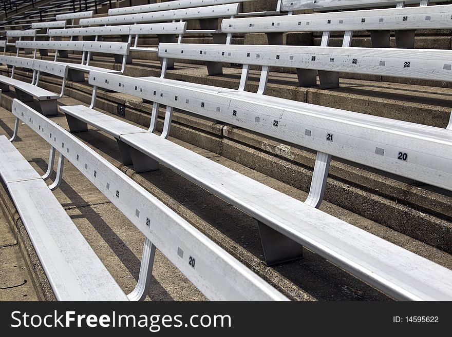 The seats in a stadium. The seats in a stadium.