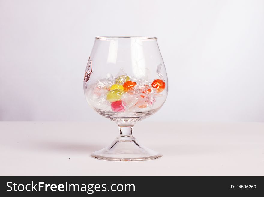 Color candies in glass on a table