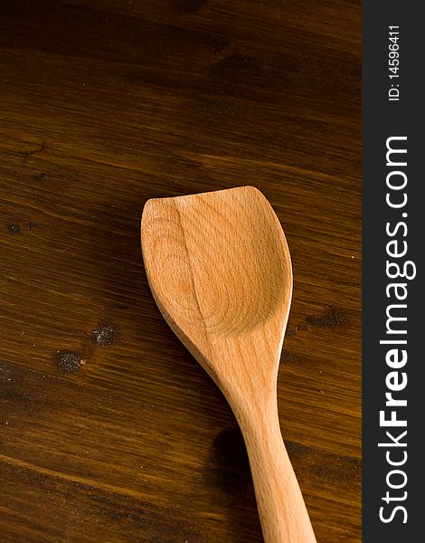 Pohoto of kitchen untensils made of wood on a wood table