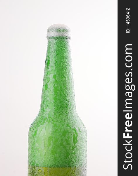 Green beer bottle  on white