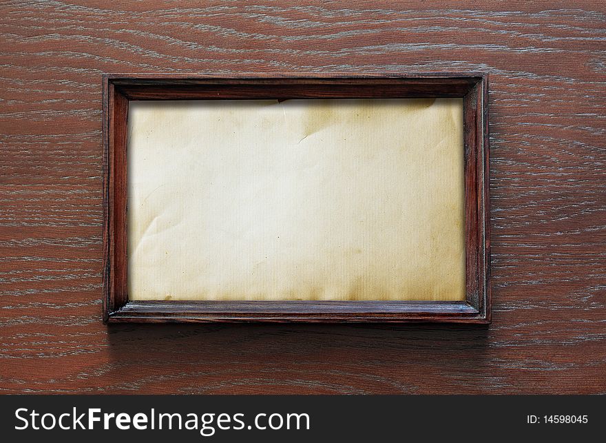 Blank photoframe on wooden wall. Blank photoframe on wooden wall
