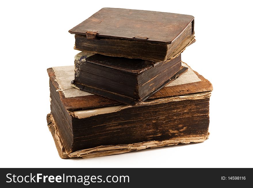 Stack of three antique tomes isolated on white
