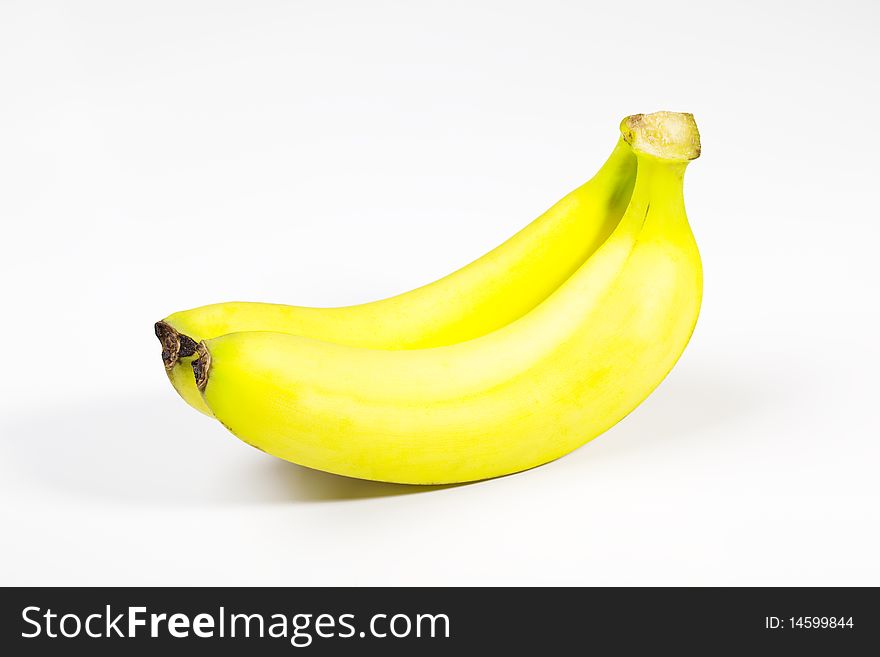 Two ripe bananas in white background. Two ripe bananas in white background.