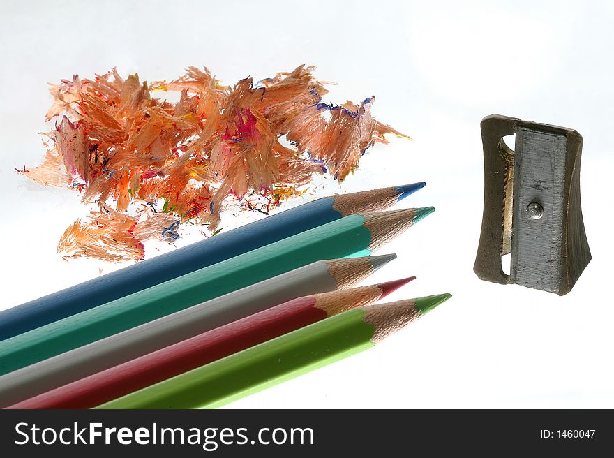 Pencils with pencil sharpener and debree. Pencils with pencil sharpener and debree