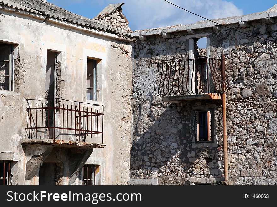 Damaged houses as a result of war and time. Damaged houses as a result of war and time