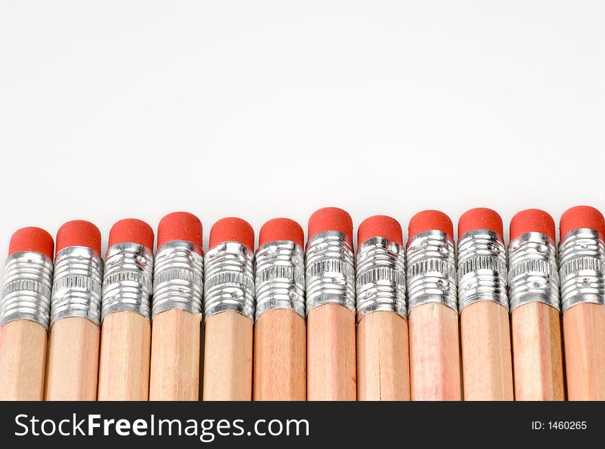Close up shot of a row of pencils