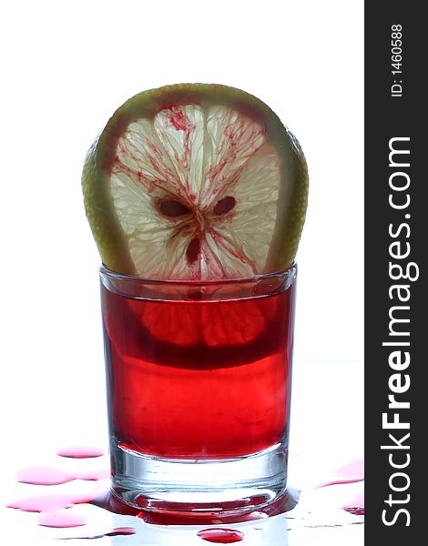 Glass with red wine and lemon slice