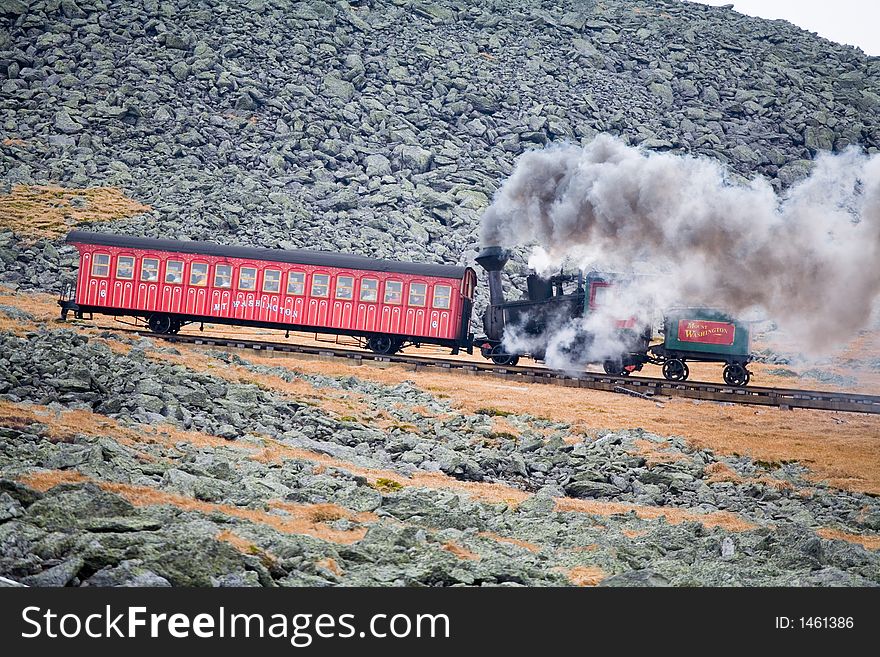 Tourist Train on Mt Washington in a Fall Cloudy Day