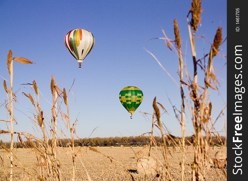 Two balloons east of McCook, Nebraska in the High Plains Balloon Race in October 2006.