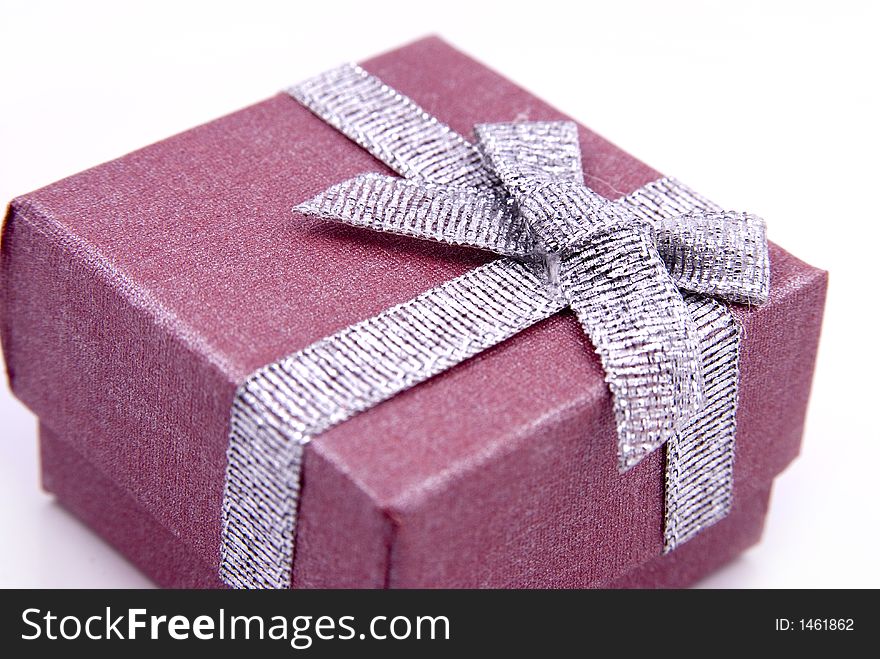 Red Gift Box with shiny silver ribbon