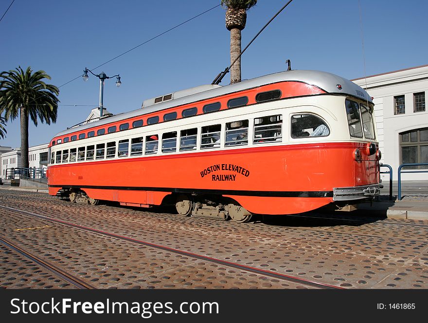 Boston Elevated Railway: orange, cream, & silver, with red stripe. Boston Elevated Railway: orange, cream, & silver, with red stripe