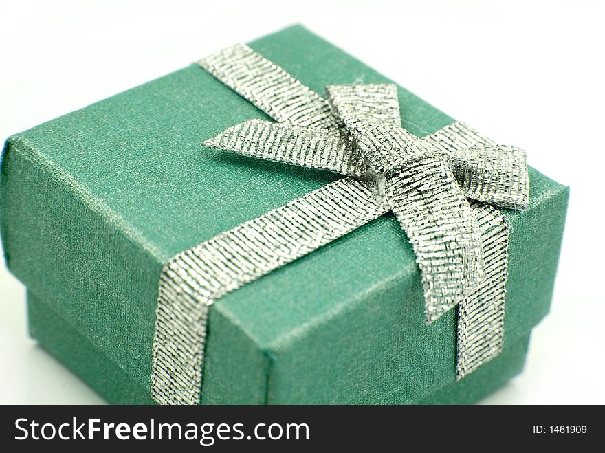 Green Gift Box with shiny silver ribbon