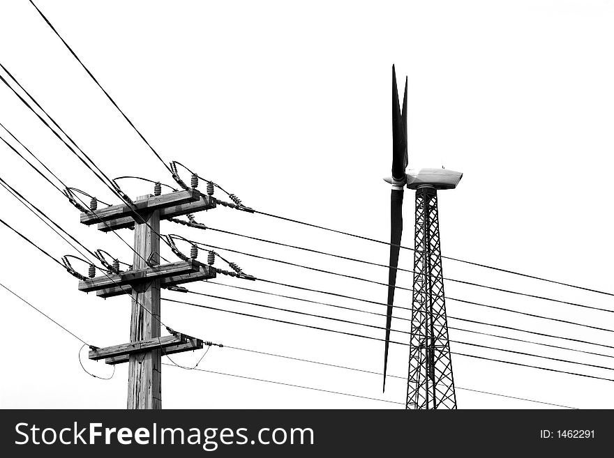 A large wind generator and power lines (B&W). A large wind generator and power lines (B&W).