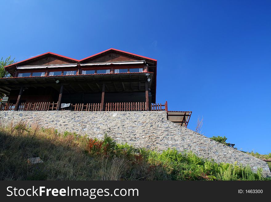 Terrace restaurant at the Olympus mountain with intense blue sky
