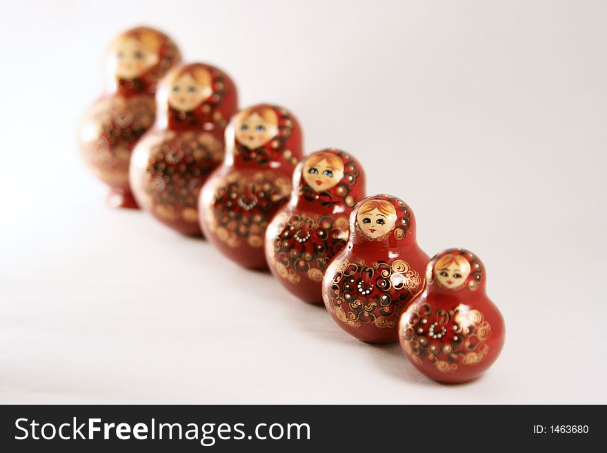 Six russian dolls on white background with DOF effect. Six russian dolls on white background with DOF effect.