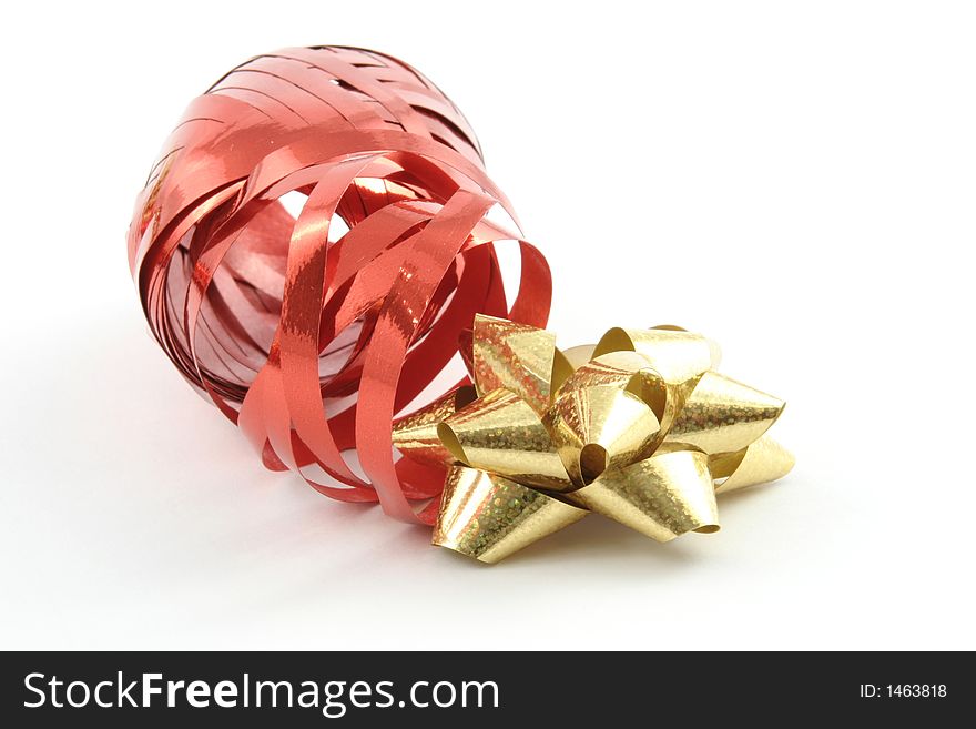 Gold gift ribbon on a white background