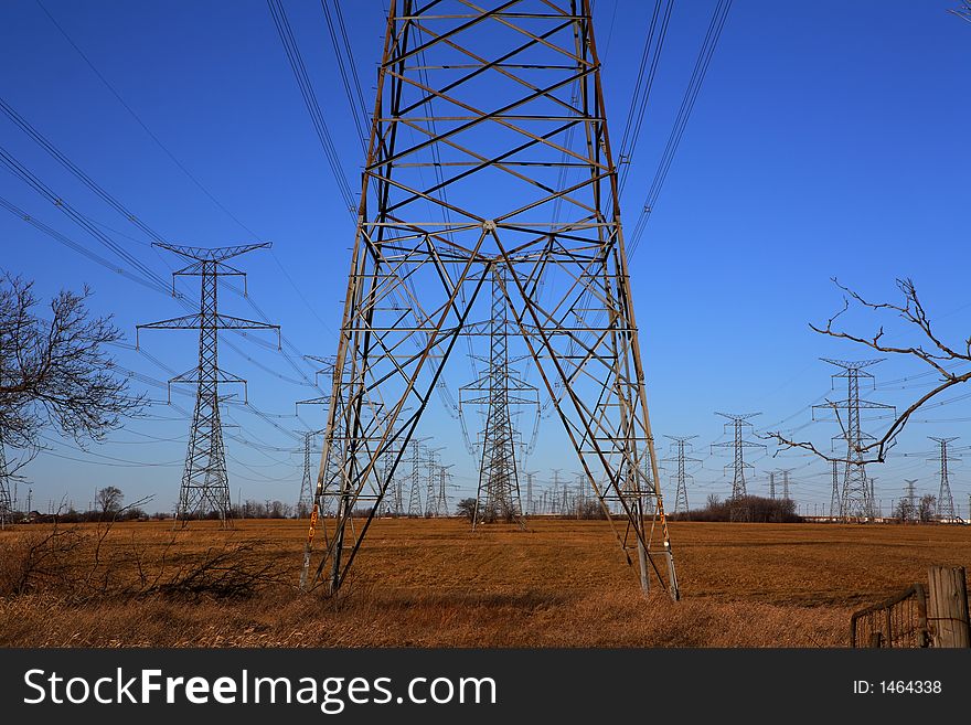 Electricity Pylons against an azure sky