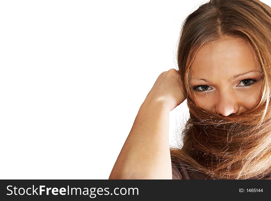 Young woman playing with hair. isolated.