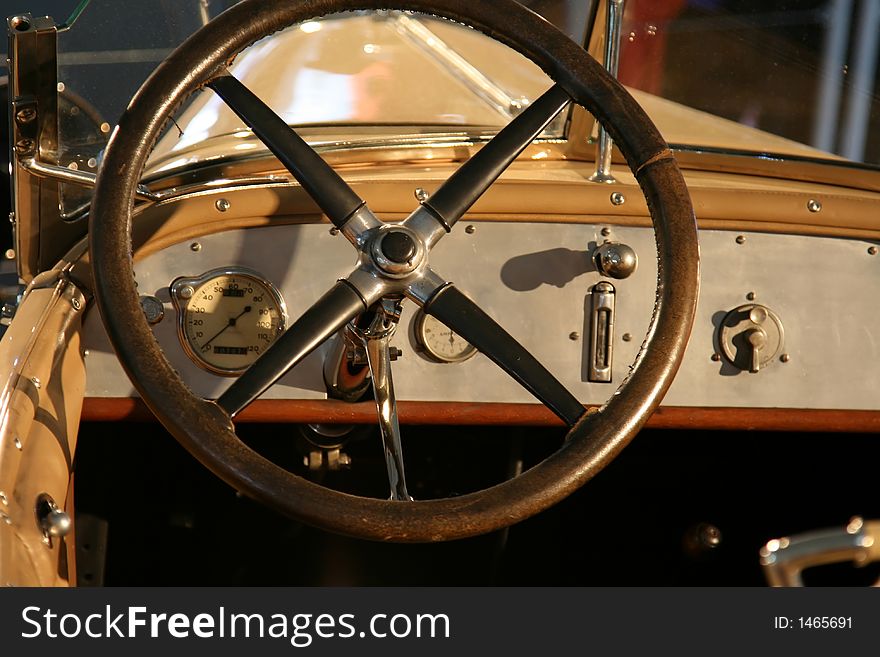 Vintage car wheel and windshield. Vintage car wheel and windshield