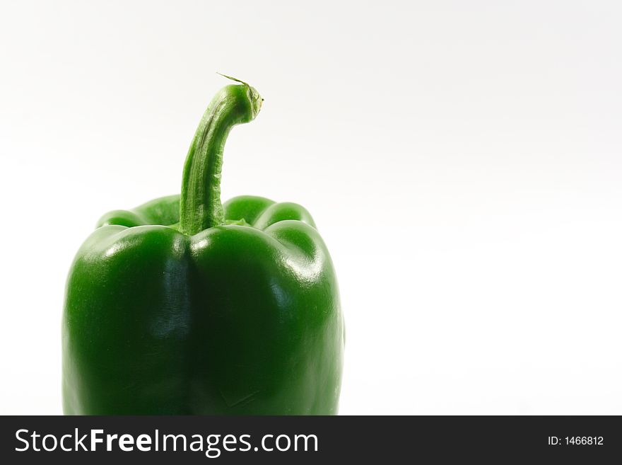 Green sweet pepper with white background