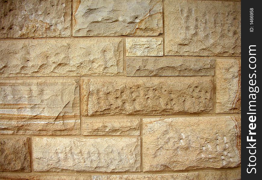 Wall background made from sandy colored bricks. Wall background made from sandy colored bricks