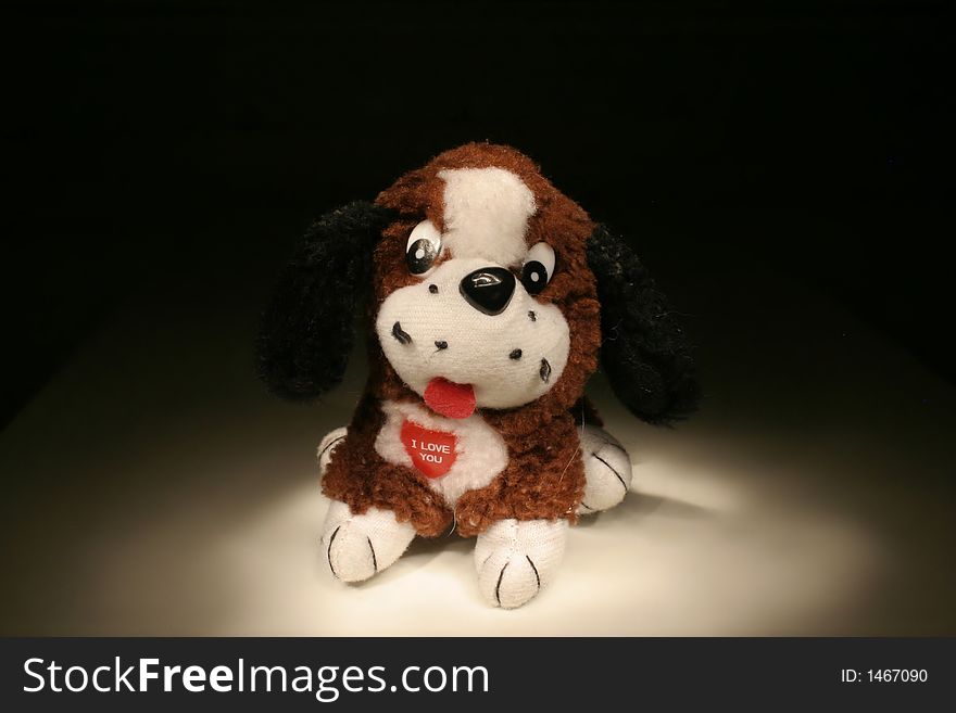 Toy dog with red heart