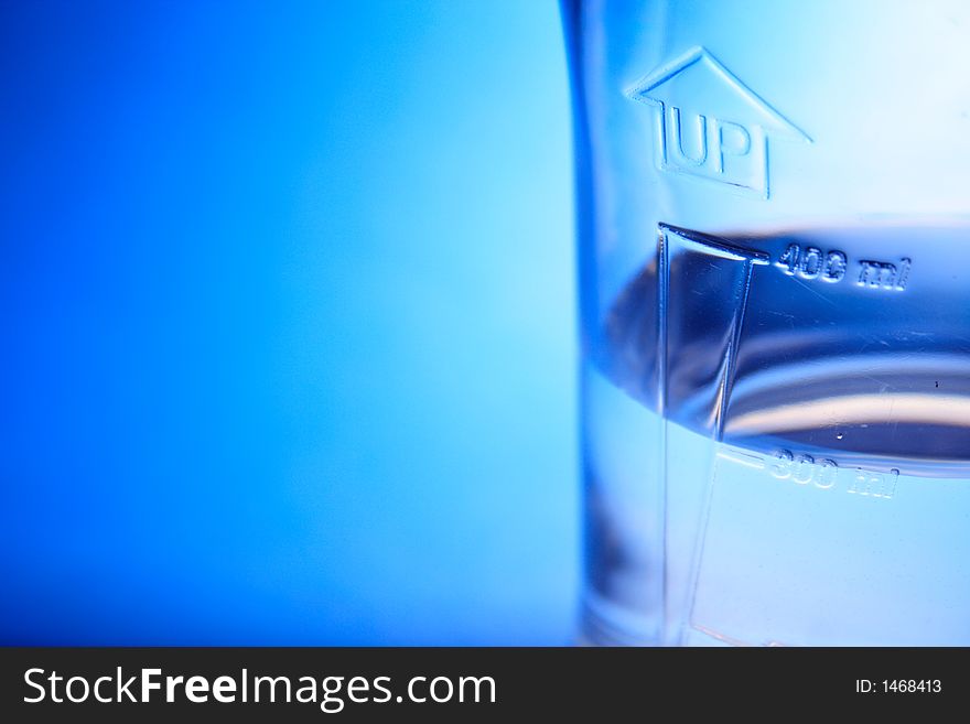 Pure water with abstract blue background