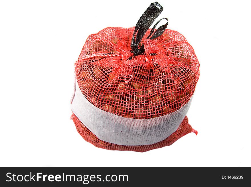 Chestnuts in a bag on white background