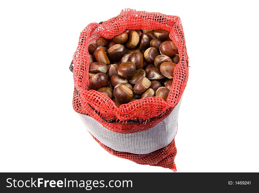 Chestnuts in a bag on white background