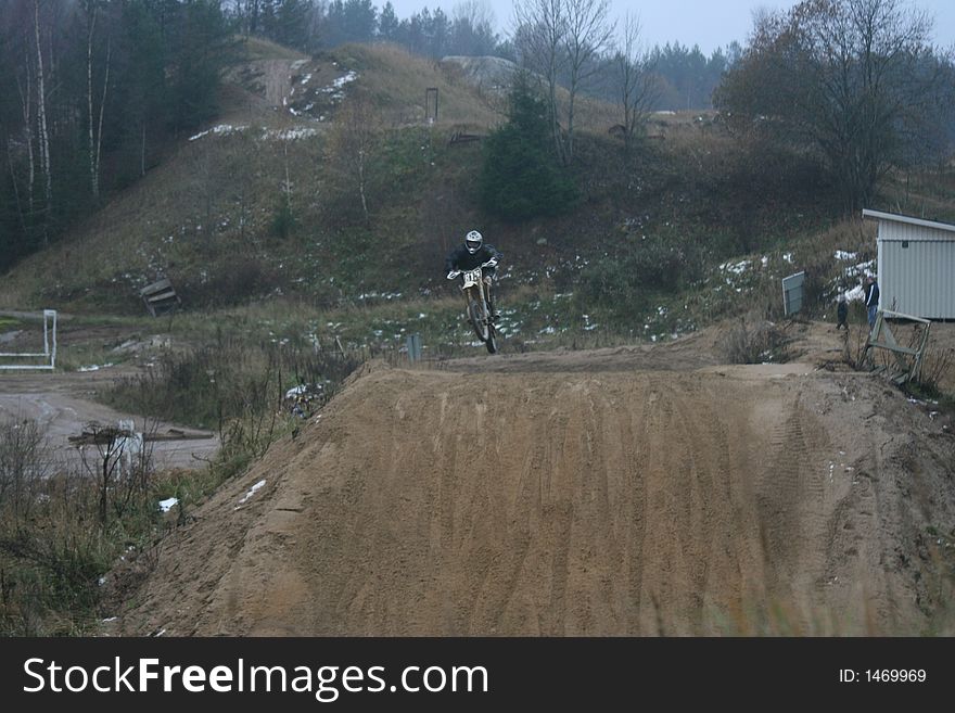 Jumping men in the motocross