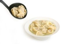 Ravioli In Ladle And In Plate Royalty Free Stock Image