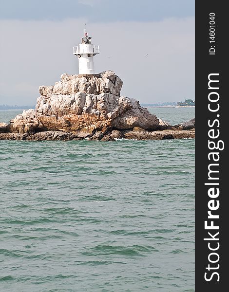 Small lighthouse in the sea at pattaya thailand