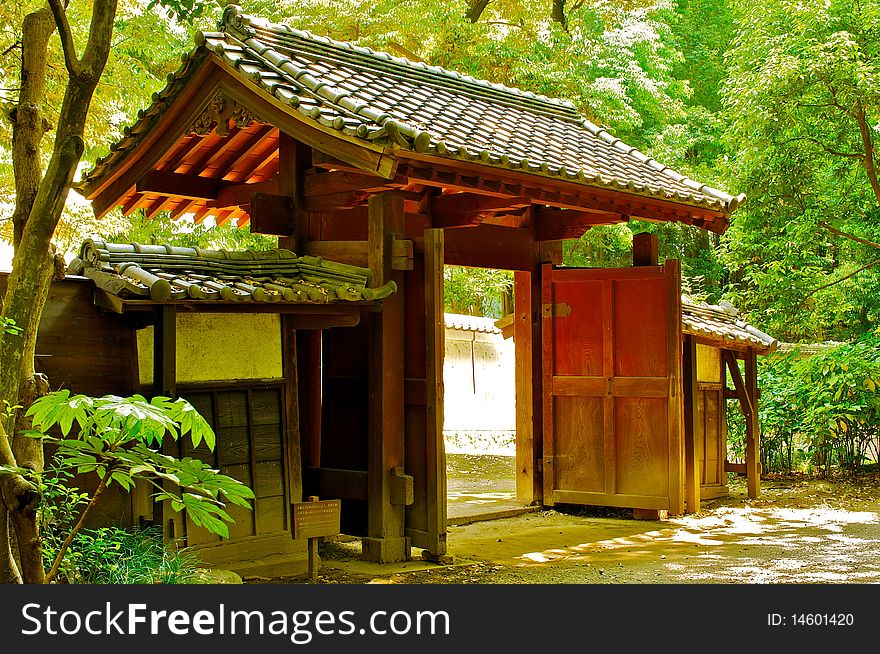 A decorative entrance to a Japanese temple and garden found in Tokyo. A decorative entrance to a Japanese temple and garden found in Tokyo