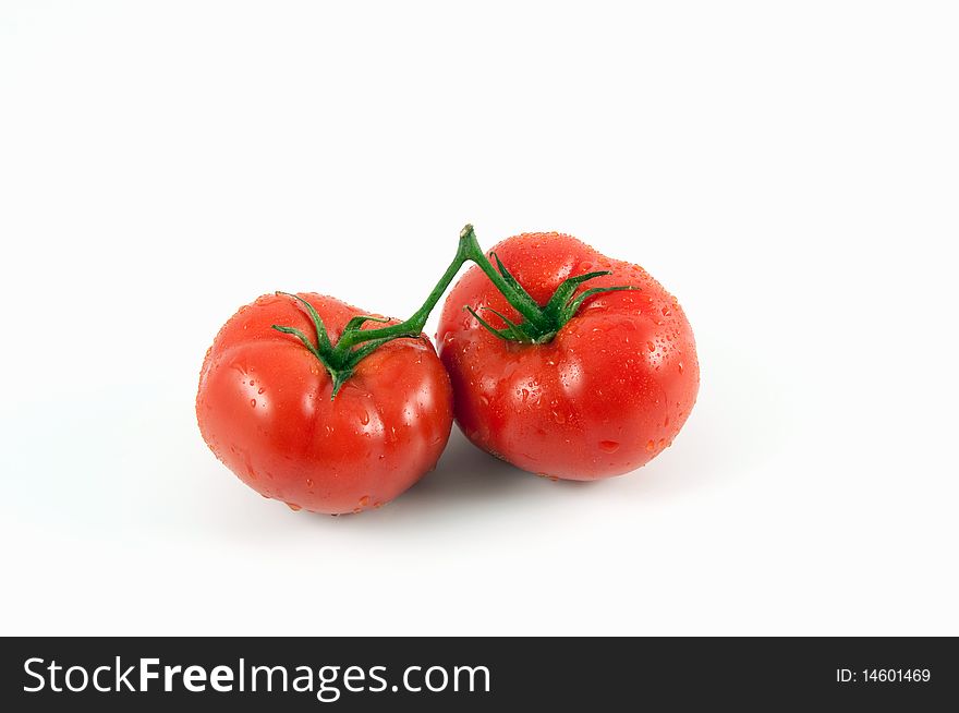 Two tomatoes isolated on white. Two tomatoes isolated on white