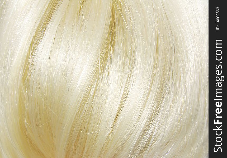 Shiny blond hair texture background