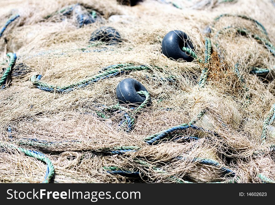 Fishing net spread on ground