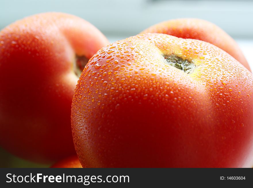 Group of three tomatoes. Red color