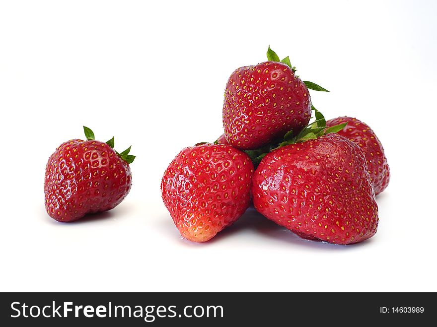 Washed fresh strawberries on the white background. Washed fresh strawberries on the white background