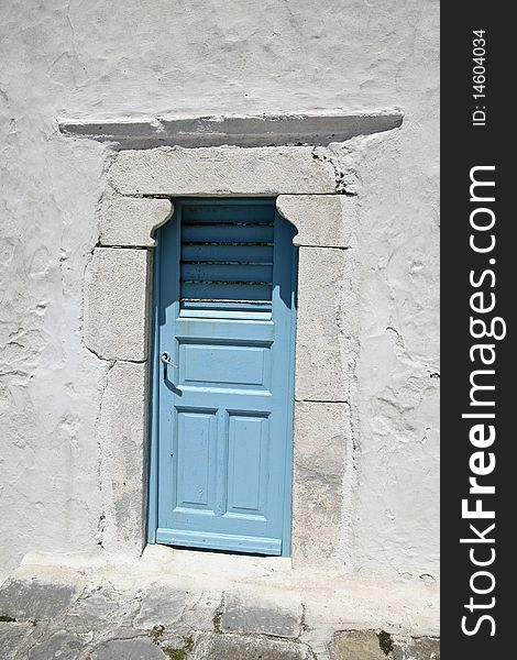 Blue Door In Greece