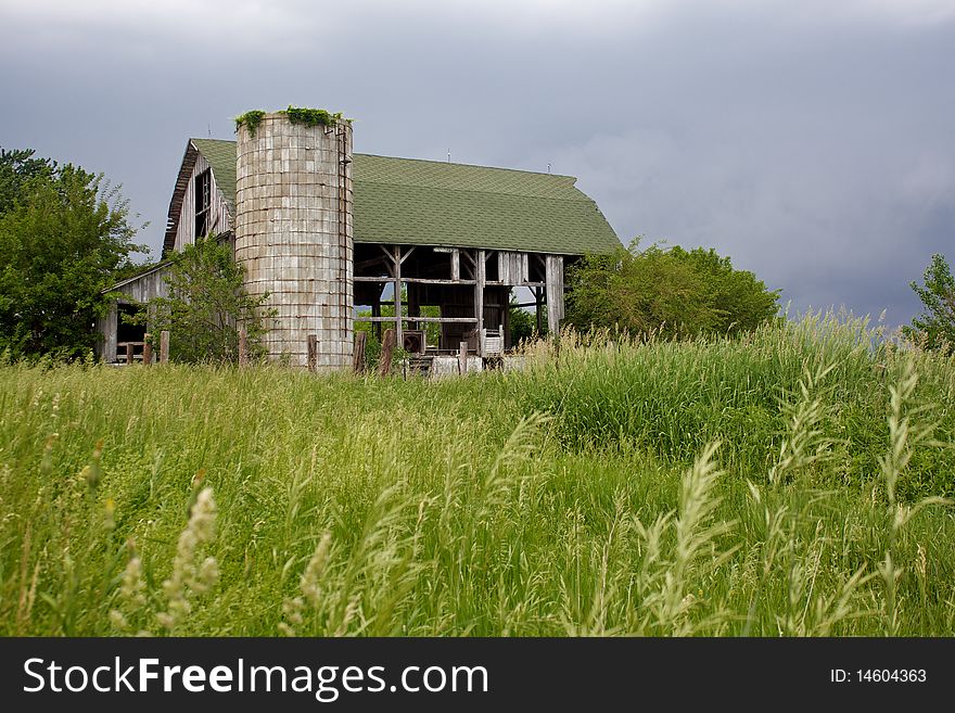 Abandoned, Run-down Barn Braces for a Storm