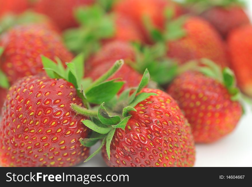 Fresh ripe red strawberries, isolated on white with soft shadow