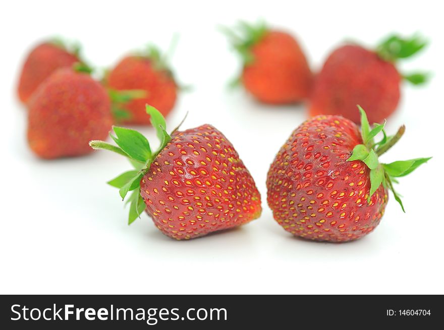 Fresh ripe red strawberries, isolated on white with soft shadow